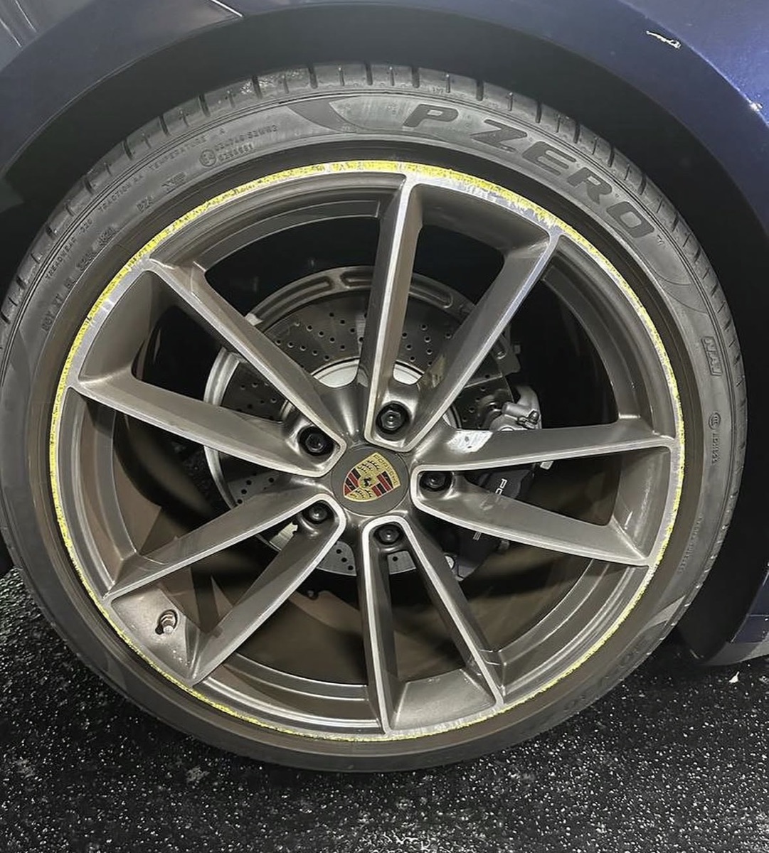 Porsche wheel, mid-repair with masking