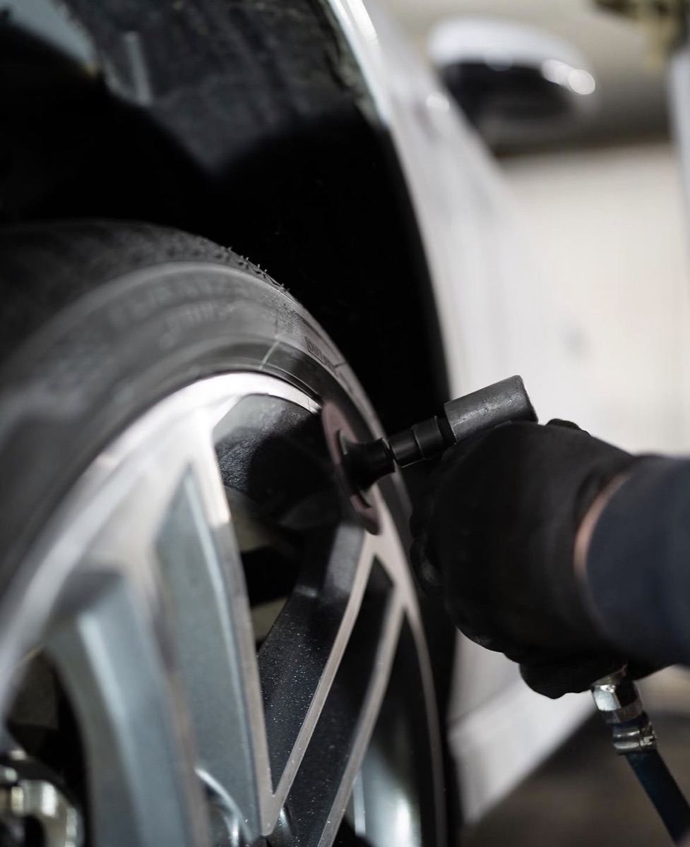 Sanding a wheel during repair