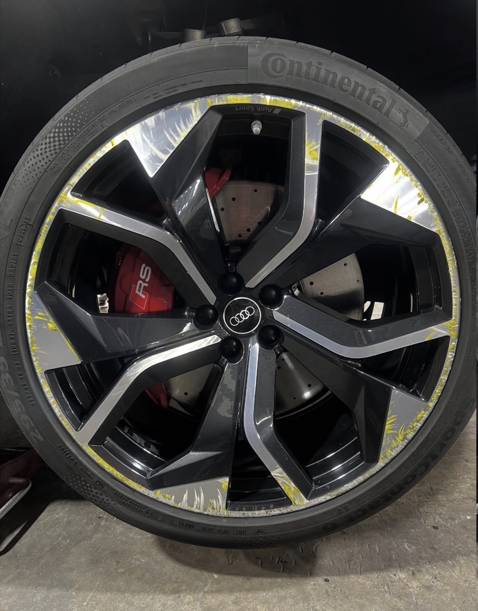 Audi RS wheel, mid-repair with masking